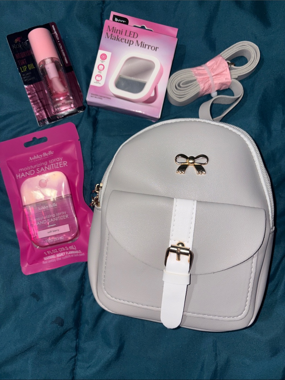 White Mini Backpack Purse with Gold Bow Accent + Essentials